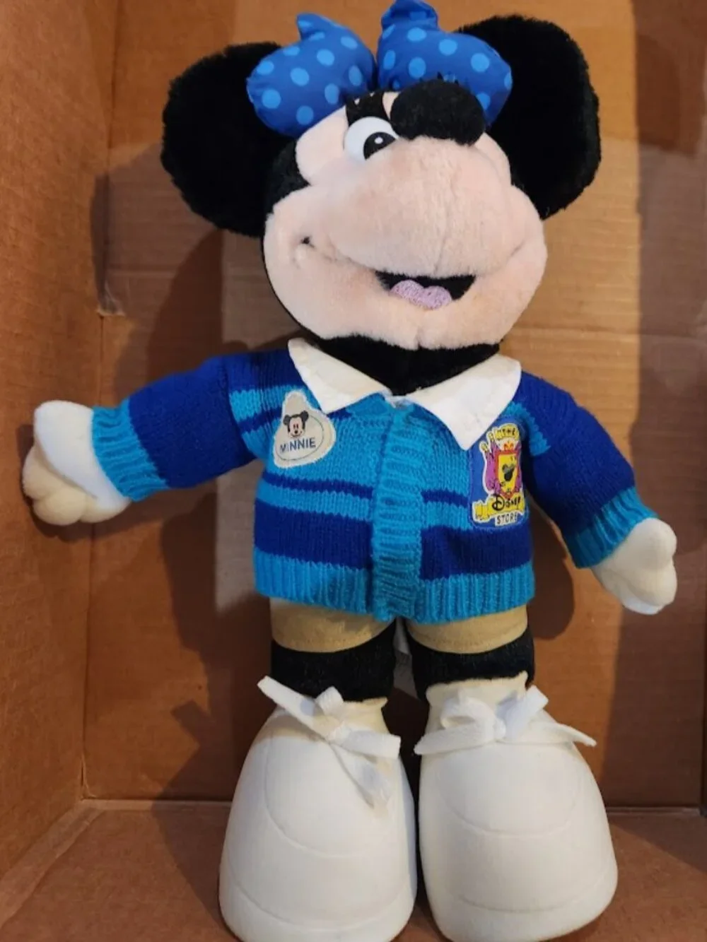 Football player Mickey and Disney Store Minnie